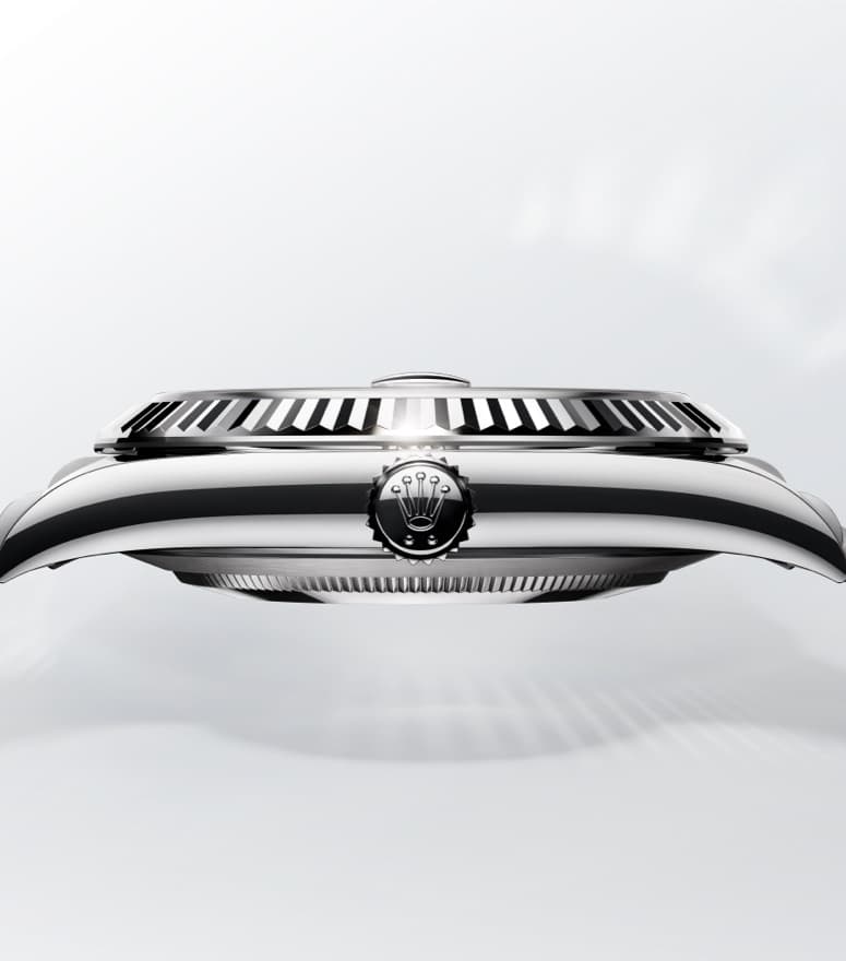 Rolex Datejust, highlighting fluted bezel and Rolex crown