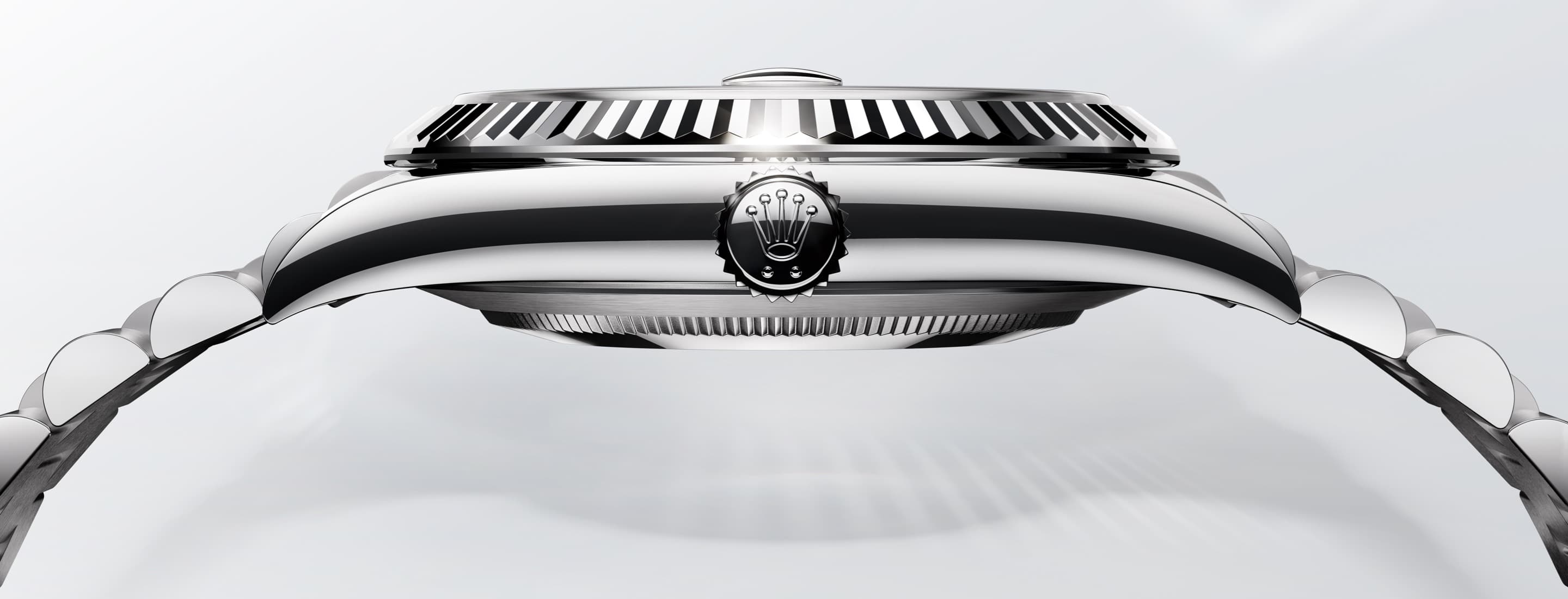 Rolex Datejust, highlighting fluted bezel and Rolex crown